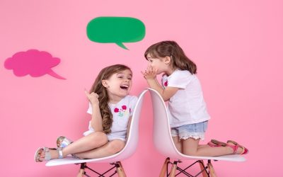 two-little-girls-colored-wall-wi